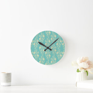 Cascading gold flowers on teal round clock