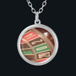 Casino Gambling Roulette Wheel Vintage Retro Style Silver Plated Necklace<br><div class="desc">A close up image of a gaming casino roulette wheel with large numbers. The colours are reminiscent of retro designs from the fifties and the  numbers have a faded vintage look to them.</div>
