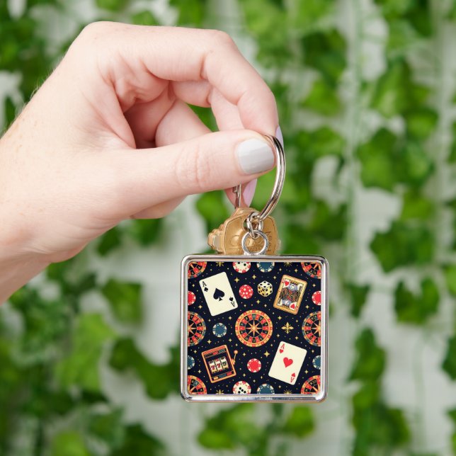 Casino pattern theme on black key ring (Hand)