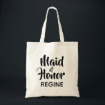 Casual Script Maid of Honour Monogram Favour Tote Bag<br><div class="desc">Trend typography monogram tote bag. Modern and stylish, this custom design features the text "Maid of Honour" in casual script lettering and an editable text field for a name in elegant sans serif in black. Easily personalise this design to match your style by clicking "Customise" to go to the design...</div>