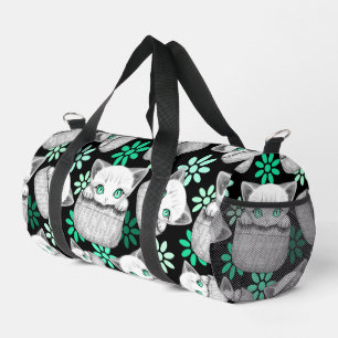 Cat Cute and Playful peaking from a Pocket Duffle Bag