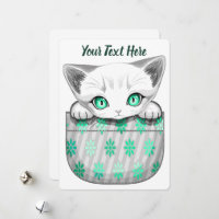 Cat Cute and Playful peaking from a Pocket