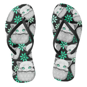 Cat Cute and Playful peaking from a Pocket Jandals