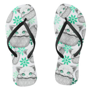 Cat Cute and Playful peaking from a Pocket Jandals