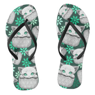 Cat Cute and Playful peaking from a Pocket Jandals