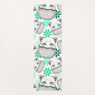 Cat Cute and Playful peaking from a Pocket Yoga Mat