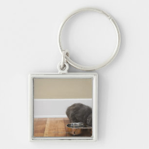 Cat eating from bowl key ring