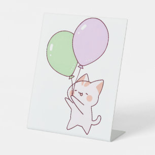 Cat holding balloon drawing pedestal sign