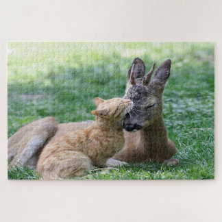 Cat kissing deer on the grass outside jigsaw puzzle