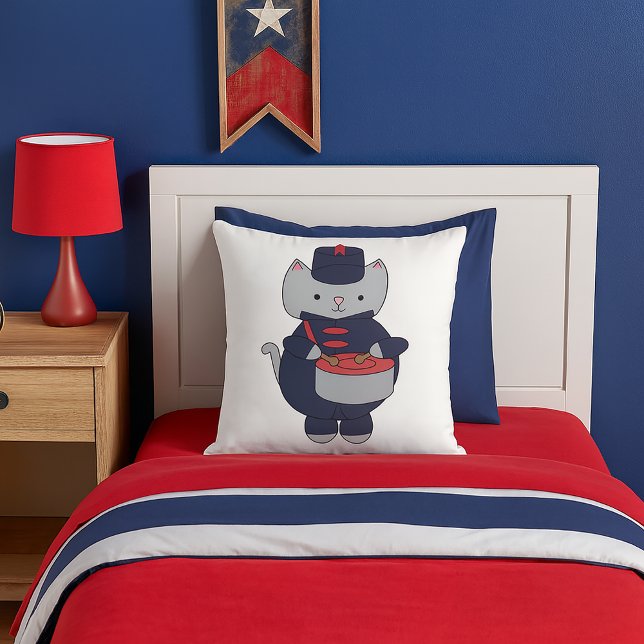 Cat Marching Band Drummer Navy Blue Red Cushion (A throw pillow featuring a gray cat playing the drums in a navy blue & red marching band uniform.)