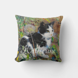 Cat on Flowerbed Cushion