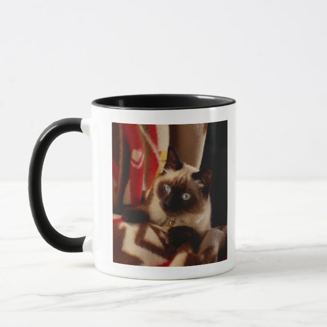 Cat peeking through quilt mug (Left)