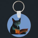 Cat reading a book key ring<br><div class="desc">Cat reading a book</div>