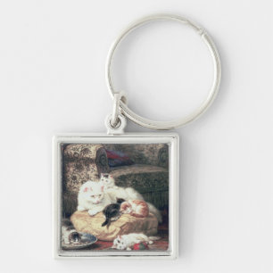 Cat with her Kittens on a Cushion Key Ring