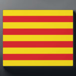 Catalonia Flag Plaque<br><div class="desc">Celebrate Catalan identity and pride with this patriotic plaque featuring the vibrant Flag of Catalonia! This eye-catching display piece showcases the bold red and yellow stripes of the Senyera, a powerful symbol of Catalonia's history, culture, and regional identity. Whether you're decorating your home, office, or event space, this plaque offers...</div>