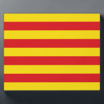Catalonia Flag Plaque<br><div class="desc">Celebrate Catalan identity and pride with this patriotic plaque featuring the vibrant Flag of Catalonia! This eye-catching display piece showcases the bold red and yellow stripes of the Senyera, a powerful symbol of Catalonia's history, culture, and regional identity. Whether you're decorating your home, office, or event space, this plaque offers...</div>
