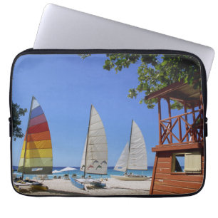 Catamarans And Lifeguard Stand On Beach Laptop Sleeve