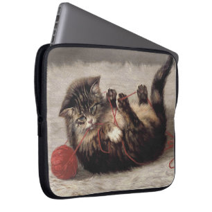 Cat's Cradle, A Cat Playing Ball of Yarn Laptop Sleeve