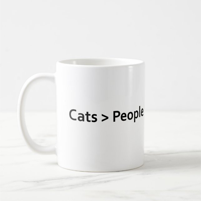 Cats greater than people coffee mug (Left)