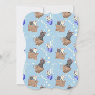Cats in box and milk drops on blue