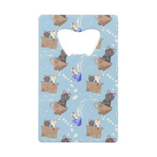 Cats in box and milk drops on blue