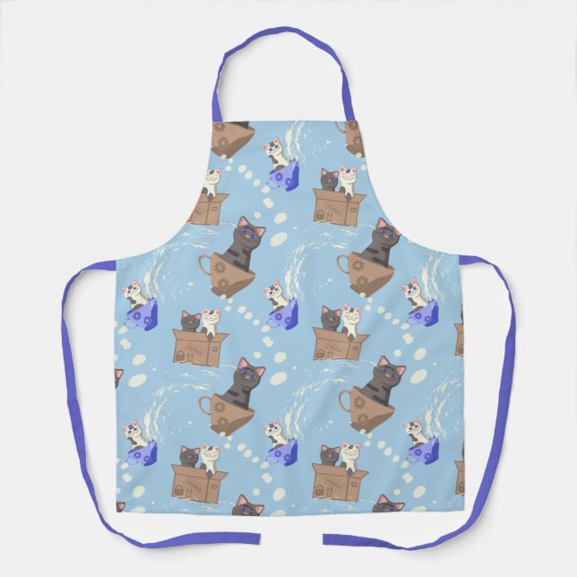 Cats in box and milk drops on blue apron (Front)