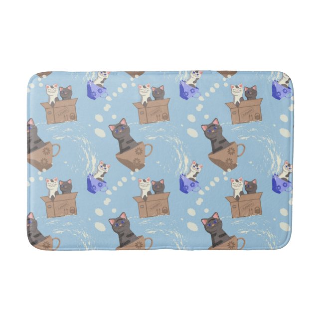 Cats in box and milk drops on blue bath mat (Front)