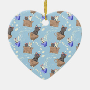 Cats in box and milk drops on blue ceramic tree decoration