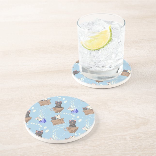 Cats in box and milk drops on blue coaster (Side)