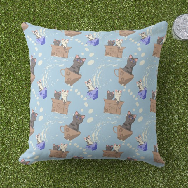 Cats in box and milk drops on blue cushion (Grass)