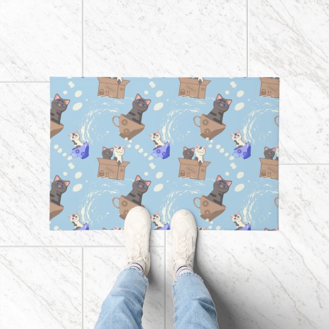 Cats in box and milk drops on blue doormat (Indoor)