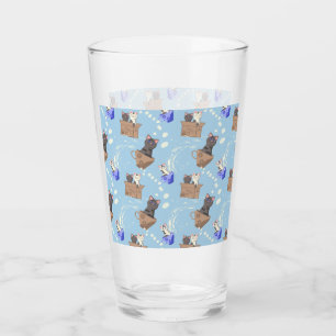 Cats in box and milk drops on blue glass