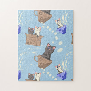 Cats in box and milk drops on blue jigsaw puzzle