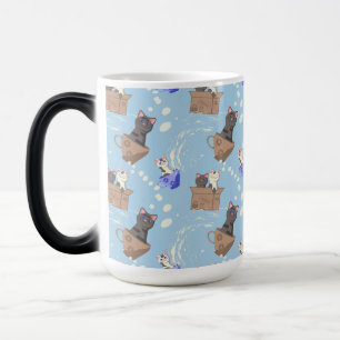 Cats in box and milk drops on blue magic mug