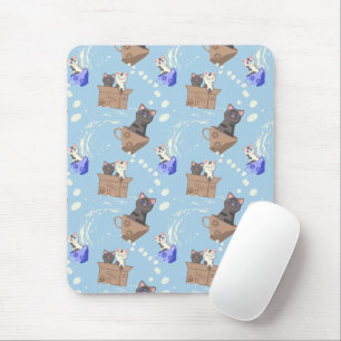 Cats in box and milk drops on blue mouse pad
