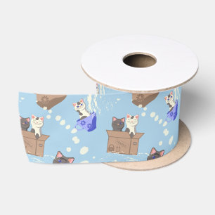Cats in box and milk drops on blue satin ribbon