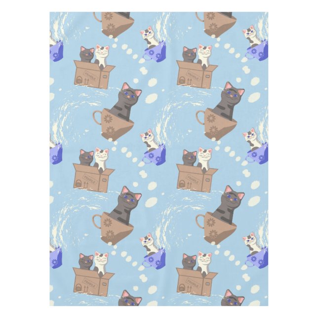 Cats in box and milk drops on blue tablecloth (Front)