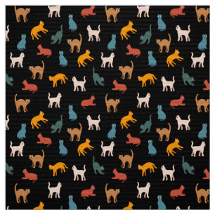 Cats on the black fabric