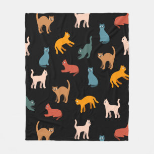 Cats on the black fleece blanket