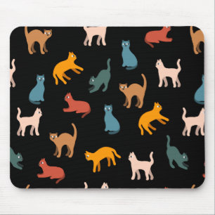 Cats on the black mouse pad