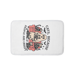 Cats People Are Creepy Skeleton Halloween Tee Over Bath Mat