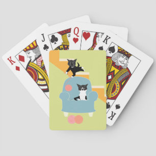 Cats playing cards