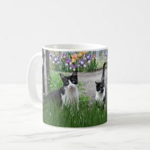 Cats Playing in Flower Garden Coffee Mug