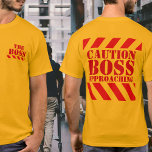 Caution BOSS warning stripes red & yellow t-shirt<br><div class="desc">Warning sign t-shirt. Fun boss t-shirt. Reads on front The boss on back caution boss approaching. A great gift for a secret santa office xmas party,  or as a prank to the boss if you are brave enough of course. Uniquely designed by Sarah Trett.</div>