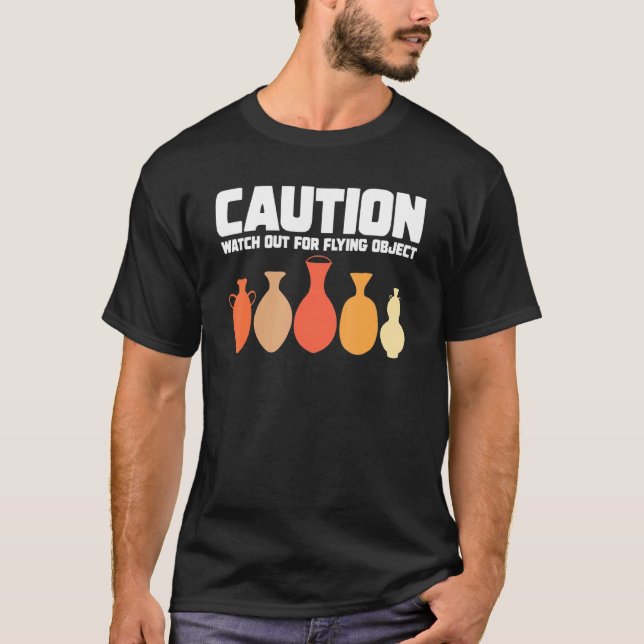 Caution Watch Out Flying Object Ceramic Artist Pot T-Shirt (Front)