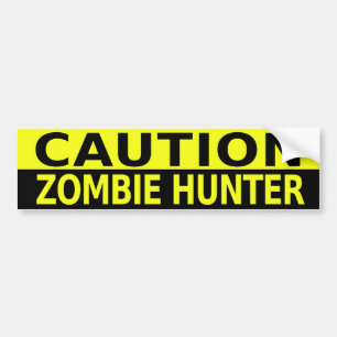 CAUTION ZOMBIE HUNTER BUMPER STICKER