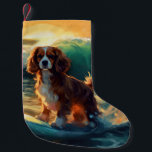 Cavalier King Beach Surfing Painting Small Christmas Stocking<br><div class="desc">Immerse yourself in the playful world of canine adventure with this captivating painting. A spirited dog takes to the waves, skilfully riding the surf on a sun-kissed beach. The vibrant artwork beautifully captures the essence of beachside excitement as the dog fearlessly rides the waves, embodying the spirit of fun and...</div>