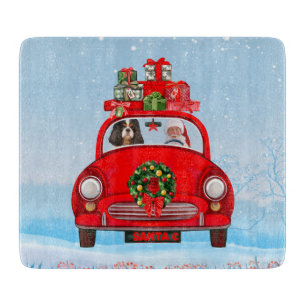 Cavalier King Dog In Car With Santa Claus  Cutting Board