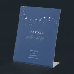 Celestial Elegant Navy Blue Wedding Favours Pedestal Sign<br><div class="desc">Invite your guests to a night of romance and starlight with this celestial elegant navy blue wedding favours pedestal sign from the Celestial Elegant Wedding Collection. Featuring a deep navy background adorned with twinkling stars and refined typography, this modern celestial design is perfect for couples who love a minimalist yet...</div>