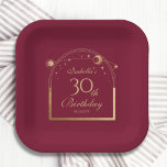 Celestial Red Gold Sun Moon Stars 30th Birthday Paper Plate<br><div class="desc">Celestial Red Gold Sun Moon Astronomy 30th Birthday Paper Plates features an elegant gold sun,  moon and stars with a golden frame on a deep pink-red background. Inside is your custom thirtieth birthday information. Personalise by editing the text in the text boxes. Designed for you by Evco Studio www.zazzle.com/store/evcostudio</div>